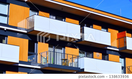 Apartments in residential complex. Housing structure at modern house. Architecture for property investment. and architecture details. Urban abstract - windows of apartment building. Apartments in residential complex. Housing structure at modern house. Architecture for property investment. and architecture details. Urban abstract - windows of apartment building. 138633936