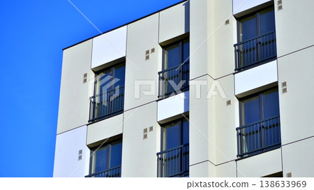 Apartments in residential complex. Housing structure at modern house. Architecture for property investment. and architecture details. Urban abstract - windows of apartment building. Apartments in residential complex. Housing structure at modern house. Architecture for property investment. and architecture details. Urban abstract - windows of apartment building. 138633969