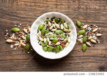 Mix of seeds in bowl Mix of seeds in bowl 138633991