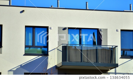 Apartments in residential complex. Housing structure at modern house. Architecture for property investment. and architecture details. Urban abstract - windows of apartment building. Apartments in residential complex. Housing structure at modern house. Architecture for property investment. and architecture details. Urban abstract - windows of apartment building. 138634055