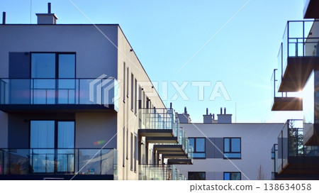 Apartments in residential complex. Housing structure at modern house. Architecture for property investment. and architecture details. Urban abstract - windows of apartment building. Apartments in residential complex. Housing structure at modern house. Architecture for property investment. and architecture details. Urban abstract - windows of apartment building. 138634058