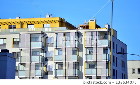 Apartments in residential complex. Housing structure at modern house. Architecture for property investment. and architecture details. Urban abstract - windows of apartment building. Apartments in residential complex. Housing structure at modern house. Architecture for property investment. and architecture details. Urban abstract - windows of apartment building. 138634073