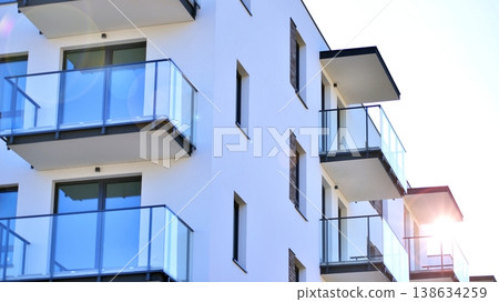 Apartments in residential complex. Housing structure at modern house.  Architecture for property investment. and architecture details. Urban abstract - windows of apartment building. 138634259