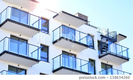 Apartments in residential complex. Housing structure at modern house. Architecture for property investment. and architecture details. Urban abstract - windows of apartment building. Apartments in residential complex. Housing structure at modern house. Architecture for property investment. and architecture details. Urban abstract - windows of apartment building. 138634260