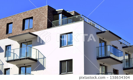 Apartments in residential complex. Housing structure at modern house. Architecture for property investment. and architecture details. Urban abstract - windows of apartment building. Apartments in residential complex. Housing structure at modern house. Architecture for property investment. and architecture details. Urban abstract - windows of apartment building. 138634304