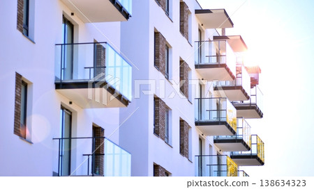 Apartments in residential complex. Housing structure at modern house.  Architecture for property investment. and architecture details. Urban abstract - windows of apartment building. 138634323