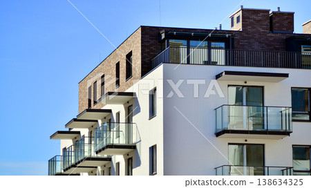 Apartments in residential complex. Housing structure at modern house.  Architecture for property investment. and architecture details. Urban abstract - windows of apartment building. 138634325