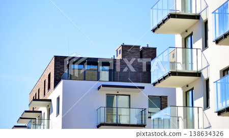 Apartments in residential complex. Housing structure at modern house. Architecture for property investment. and architecture details. Urban abstract - windows of apartment building. Apartments in residential complex. Housing structure at modern house. Architecture for property investment. and architecture details. Urban abstract - windows of apartment building. 138634326