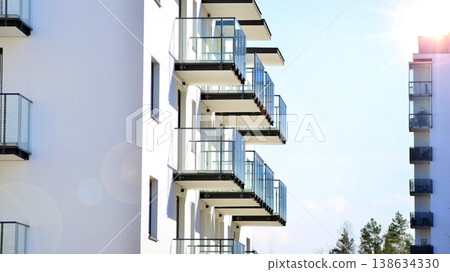 Apartments in residential complex. Housing structure at modern house.  Architecture for property investment. and architecture details. Urban abstract - windows of apartment building. 138634330