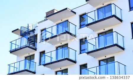 Apartments in residential complex. Housing structure at modern house. Architecture for property investment. and architecture details. Urban abstract - windows of apartment building. Apartments in residential complex. Housing structure at modern house. Architecture for property investment. and architecture details. Urban abstract - windows of apartment building. 138634337