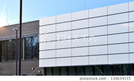 Empty new constructed automobile dealership. The building contains a sales room, offices, service and parts warehouse. Empty new constructed automobile dealership. The building contains a sales room, offices, service and parts warehouse. 138634535