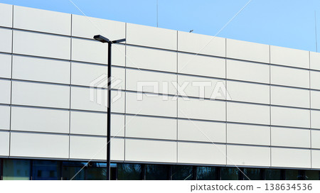 Empty new constructed automobile dealership. The building contains a sales room, offices, service and parts warehouse. Empty new constructed automobile dealership. The building contains a sales room, offices, service and parts warehouse. 138634536