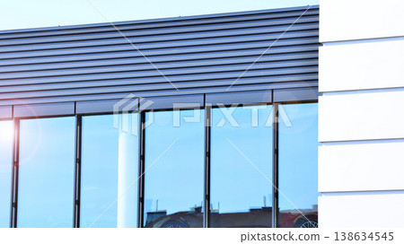 Empty new constructed automobile dealership. The building contains a sales room, offices, service and parts warehouse.  138634545