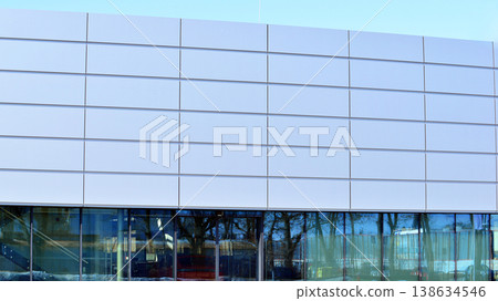 Empty new constructed automobile dealership. The building contains a sales room, offices, service and parts warehouse.  138634546