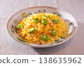 Fried rice with broad beans and cheese 138635962