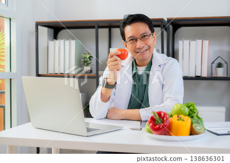 Portrait asian man nutritionist working in medical clinic office. Portrait asian man nutritionist working in medical clinic office. 138636301