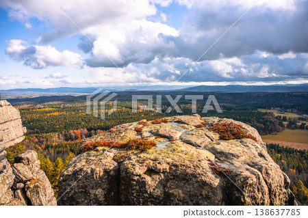 Explore stunning lookout points at Southern Terraces in Stolowe Mountains National Park, Poland. Autumn colors highlight the unique sandstone formations against a vibrant sky. Explore stunning lookout points at Southern Terraces in Stolowe Mountains National Park, Poland. Autumn colors highlight the unique sandstone formations against a vibrant sky. 138637785