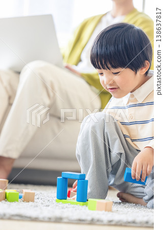 Children playing in the living room Children playing in the living room 138637817