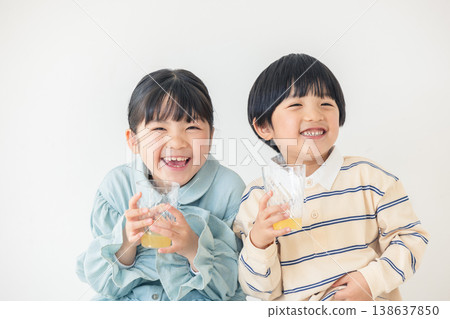 Child drinking juice Child drinking juice 138637850