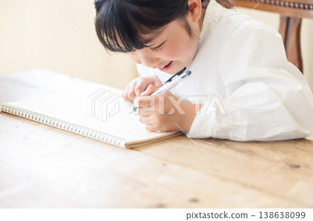 Girl studying Girl studying 138638099
