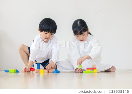 Children playing with building blocks Children playing with building blocks 138638146
