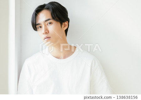 man wearing white t-shirt man wearing white t-shirt 138638156