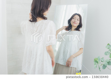 A woman looking at her 138638440