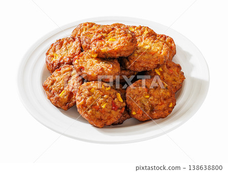 Thai corn fritters tod mun khao pod on plate Thai corn fritters tod mun khao pod on plate 138638800