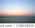 Sea and sky horizon line sunset time. 138638836
