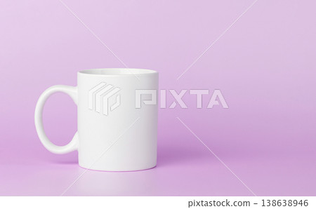 white cup for tea or coffee on a pink background 138638946