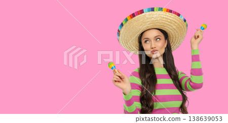 Cinco de Mayo, Woman dancing with maracas and sombrero 138639053