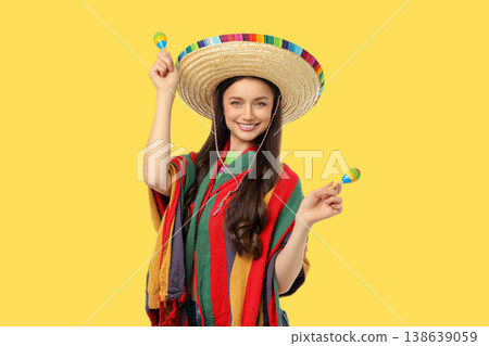 Young woman celebrates Cinco de Mayo in sombrero 138639059