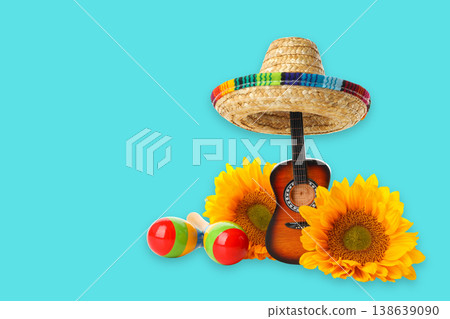 Cinco de Mayo, Sombrero, guitar, maracas, and sunflowers shine 138639090