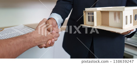 Handshake between real estate agent and client Handshake between real estate agent and client 138639247