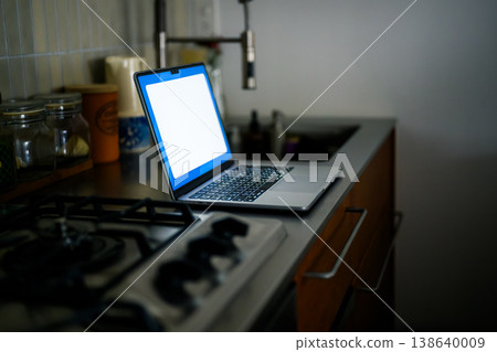 Laptop on the kitchen counter 138640009