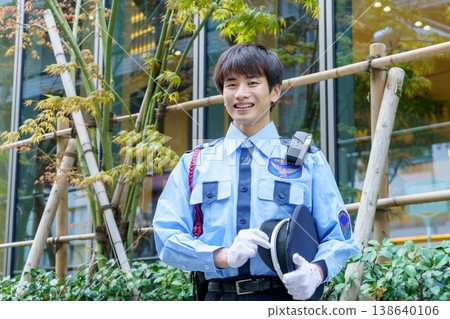 Young Japanese male security guard. Filming assistance provided by: Denpa Gakuen Educational Foundation, Tokyo Electronics College. Young Japanese male security guard. Filming assistance provided by: Denpa Gakuen Educational Foundation, Tokyo Electronics College. 138640106