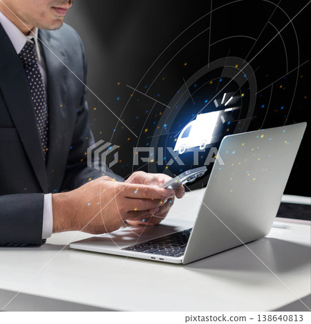A professional businessman uses a smartphone and laptop to manage logistics and track delivery status through a modern digital interface 138640813