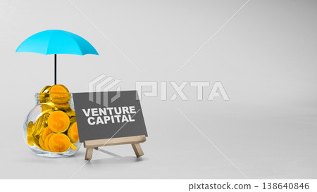 A glass jar filled with gold coins is sheltered by a blue umbrella next to a venture capital sign, symbolizing protected investment and financial growth on a neutral background 138640846