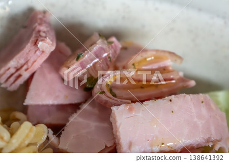Sliced shallot in a salad, health benefits of onion and garlic Sliced shallot in a salad, health benefits of onion and garlic 138641392