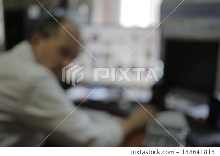 Business office with blurred people casual wear. Business office with blurred people casual wear. 138641813