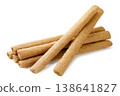 Pile of wafer sticks close-up on a white background. Isolated 138641827