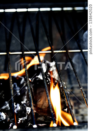 Outside BBQ Grill With Bright Flames And Glowing Coals ready for cooking on Outside BBQ Grill With Bright Flames And Glowing Coals ready for cooking on 138642020