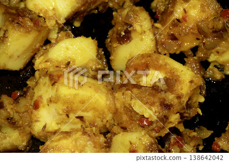 Close up of home made spicy Bombay potatoes with spinach Indian snack dish Close up of home made spicy Bombay potatoes with spinach Indian snack dish 138642042