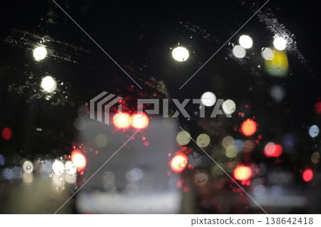 Close-up of raindrops on a window pane. 138642418
