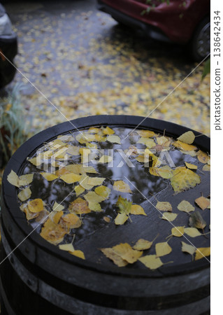An oak barrel on an autumn street. 138642434