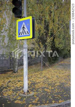 A road crossing sign on a semaphore pole. A road crossing sign on a semaphore pole. 138642523