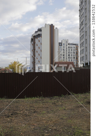 Construction of new houses instead of old ones. Construction of new houses instead of old ones. 138642532