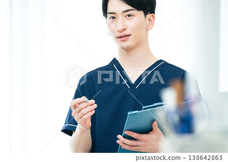 Young male healthcare worker Young male healthcare worker 138642863