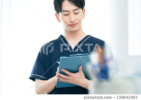 Young male healthcare worker Young male healthcare worker 138642865