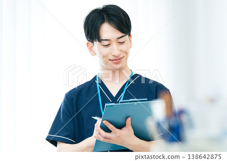 Young male healthcare worker Young male healthcare worker 138642875